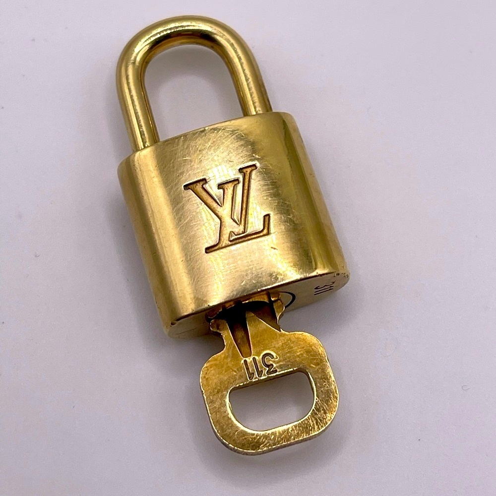 100% Authentic and pre loved Louis Vuitton - Gold Lock and Key set #311